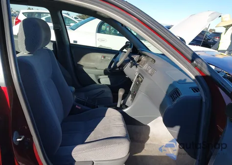 2001 Toyota Camry Le z USA, uszkodzony, nr VIN JT2BG22KX10548872